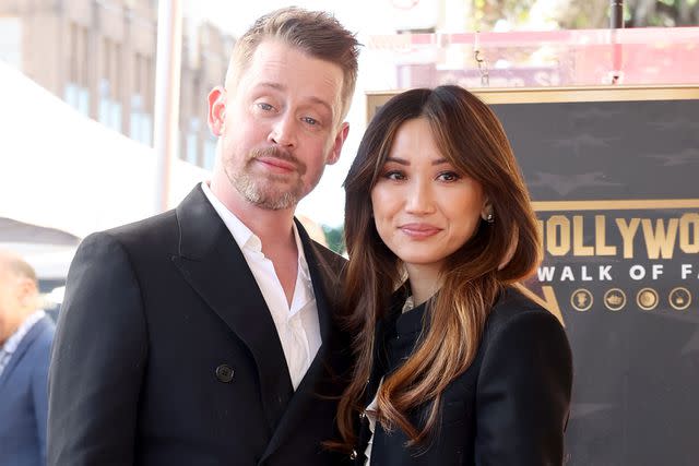 <p>Amy Sussman/Getty</p> Macaulay Culkin and Brenda Song on December 01, 2023 in Hollywood, California.