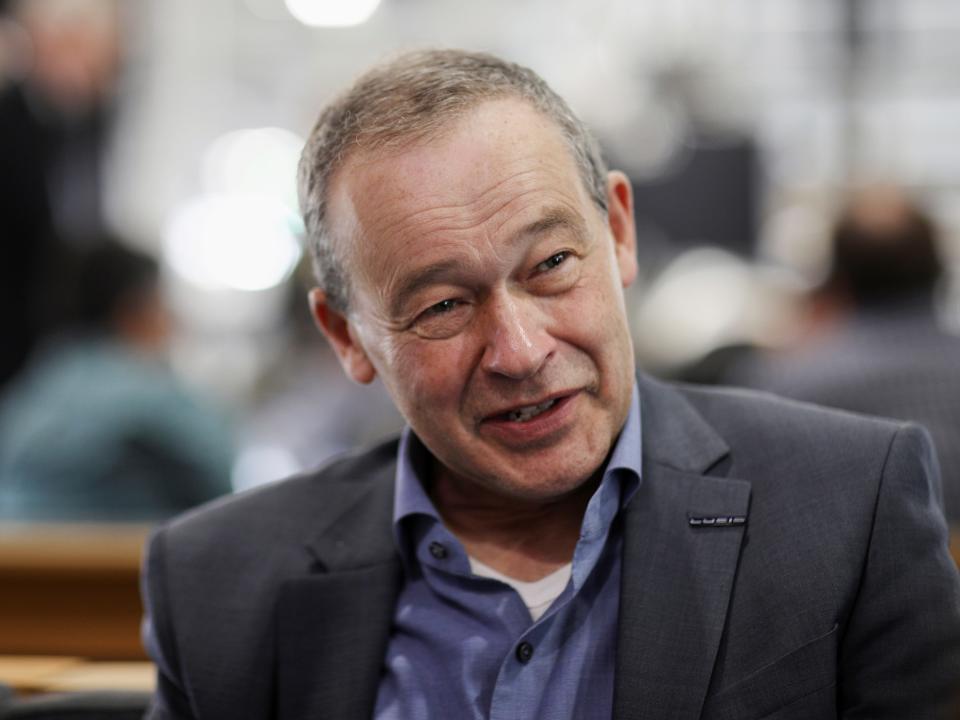 CEO Peter Rawlinson speaks with a reporter at the Lucid Motors plant in Casa Grande, Arizona, U.S. September 28, 2021.