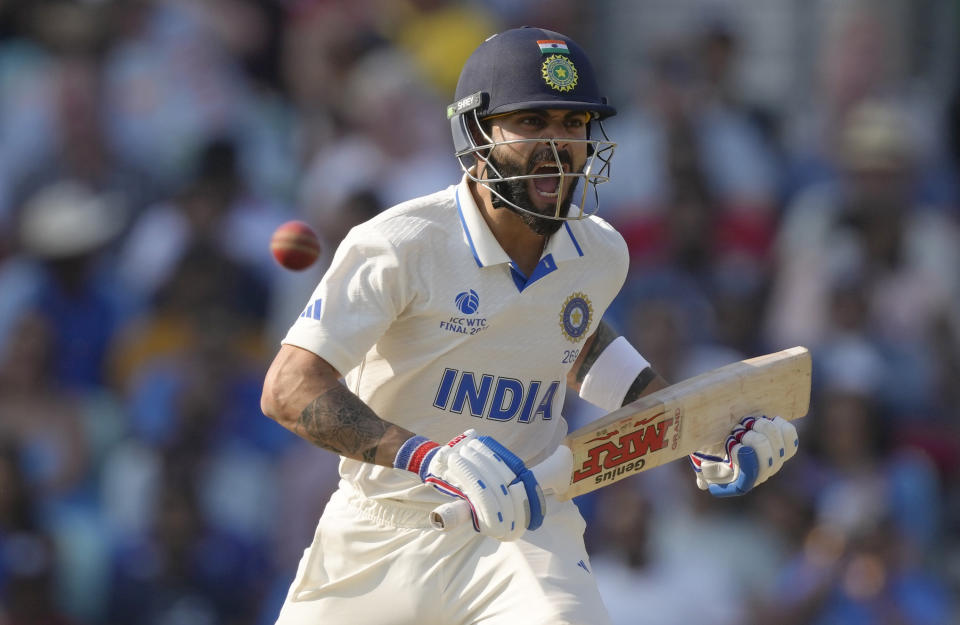 India's Virat Kohli shouts to his playing partner India's Ajinkya Rahane on the fourth day of the ICC World Test Championship Final between India and Australia at The Oval cricket ground in London, Saturday, June 10, 2023. (AP Photo/Kirsty Wigglesworth)