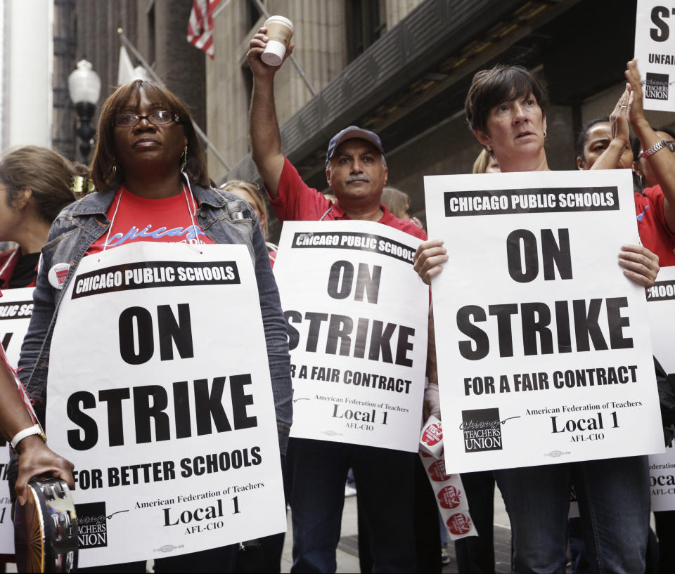 Chicago Teachers Union members listen to an update about negotiations on the fourth day of their strike on Sept. 13, 2012.&nbsp; (Photo: John Gress/Reuters)