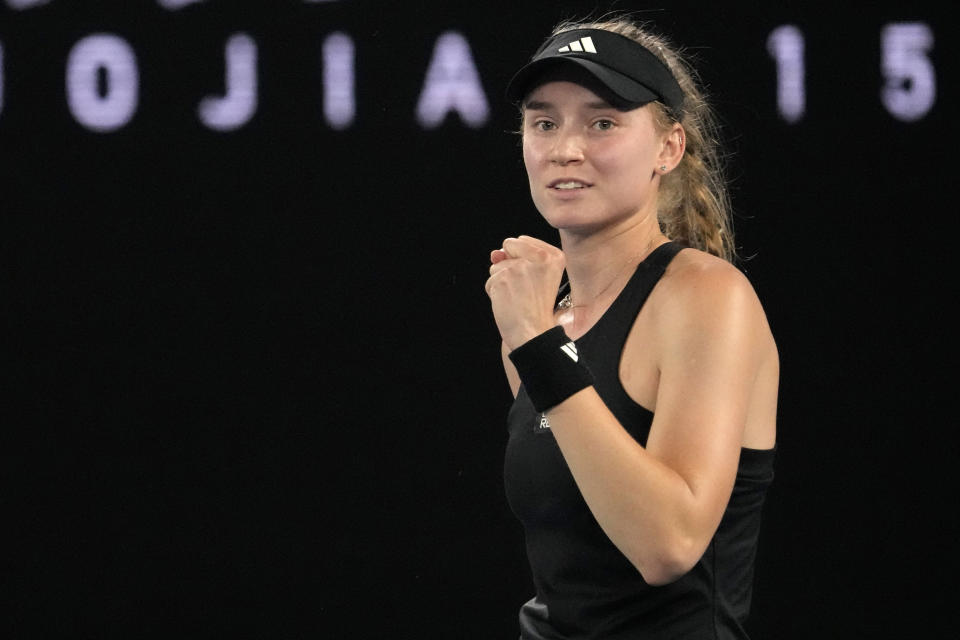 Elena Rybakina of Kazakhstan reacts after defeating Jelena Ostapenko of Latvia in their quarterfinal match at the Australian Open tennis championship in Melbourne, Australia, Tuesday, Jan. 24, 2023. (AP Photo/Aaron Favila)