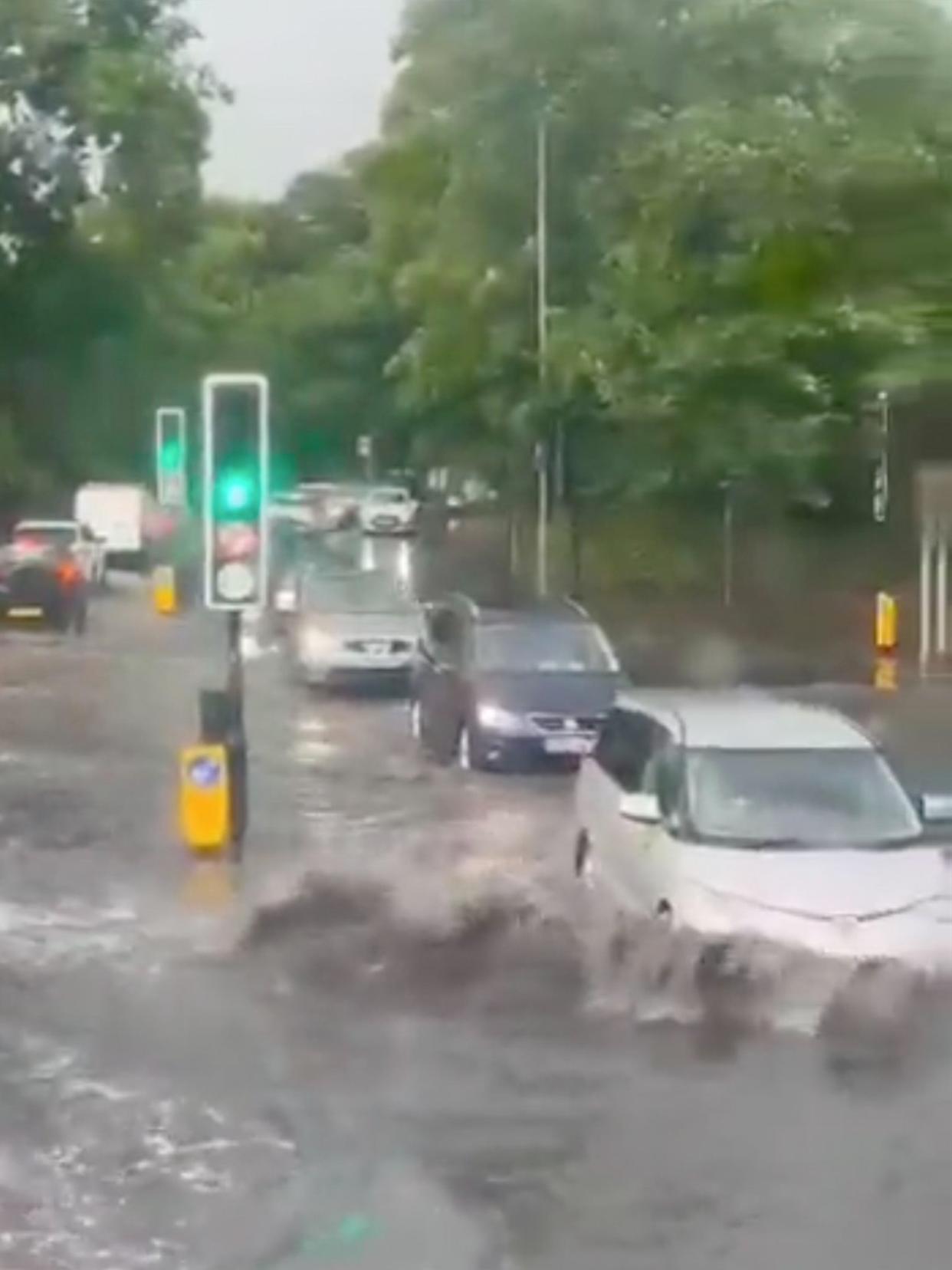 Flooding on road in London on 12 June (@SZ_Royde/Twitter)