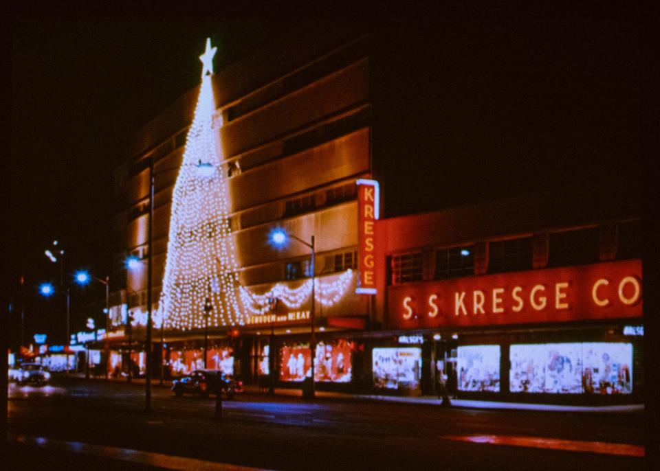 During the Christmas shopping season, the six-story façade of Denholm & McKay at 484 Main St. would be adorned with an 80-foot tall “tree of lights” made up of 2,500 10-watt bulbs and complete with a 12-foot star on top and 70-foot-long base.