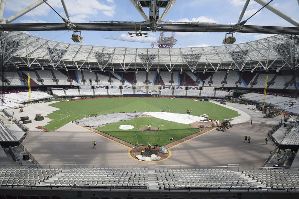 A general view of the London Stadium, home of West Ham United, as the pitch is transformed into a baseball field Thursday, June 15, 2023. The baseball field being installed at London Stadium will be slightly bigger than the one in 2019. The St. Louis Cardinals and Chicago Cubs will play two games at the home of Premier League club West Ham next weekend. (Lucy North/PA via AP)