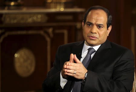 Egypt's then-presidential candidate, former army chief Abdel Fattah al-Sisi, gestures during an interview with Reuters in Cairo, Egypt in this May 14, 2014 file photo. REUTERS/Amr Abdallah Dalsh/Files