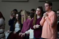 <p>Students attend a prayer vigil for students killed and injured after a 15-year-old boy opened fire with a handgun at Marshall County High School, at Life in Christ Church in Marion, Kentucky, Jan. 23, 2018. (Photo: Harrison McClary/Reuters) </p>