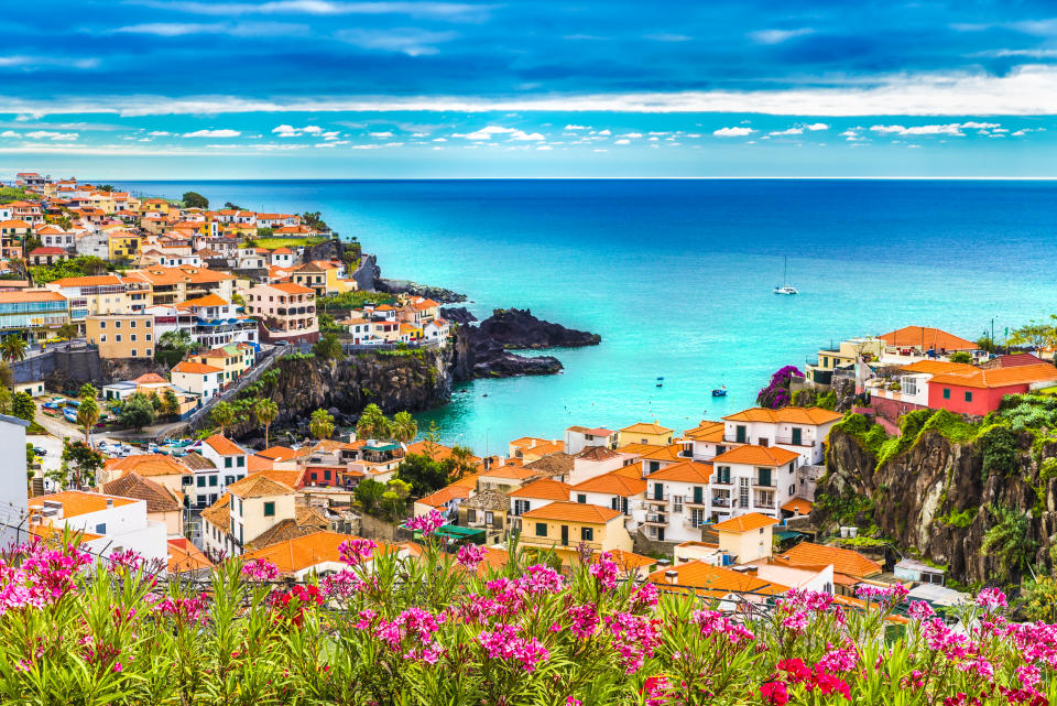 The pretty terracotta roofed buildings of Camara de Lobos, a suburb of the capital Funchal, make it a picture perfect place to stay on Madeira island. (Getty Images)