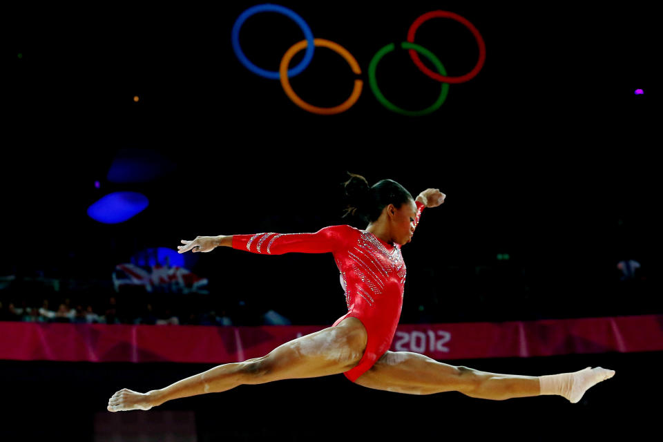 Gabrielle Douglas of the United States of America competes on the balance beam in the Artistic Gymnastics Women's Team final on Day 4 of the London 2012 Olympic Games at North Greenwich Arena on July 31, 2012 in London, England. (Photo by Ronald Martinez/Getty Images)