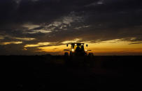 Cotton is harvested on the farm of Billie D Simpson, Wednesday, Sept. 15, 2021, in San Benito, Texas. Across the Rio Grande Valley, a multimillion-dollar crop industry and fast-growing cities get water from an irrigation system designed nearly a century ago for agriculture. (AP Photo/Eric Gay)