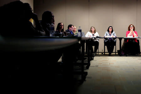 Public Health Educator and Opioid Overdose Prevention Coordinator at the Broome County Health Department Marissa Lamphere, Broome County Director of Public Health Rebecca Kaufman and Drug Free Communities Coordinator Maria Fabrizi chair a meeting of the Broome Opioid Awareness Council and Drug Free Communities group the Broome County Health Department in Binghamton, New York, U.S., April 6, 2018. REUTERS/Andrew Kelly