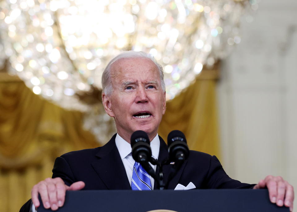 U.S. President Joe Biden discusses his 'Build Back Better' agenda for economic growth and job creation following early morning Senate passage of the bipartisan infrastructure bill and the budget resolution, during a speech in the East Room at the White House in Washington, U.S., August 11, 2021. REUTERS/Evelyn Hockstein