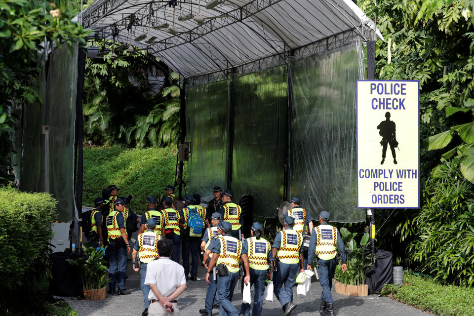 Auxiliary police report for duty at Capella Hotel on Sentosa Island in Singapore June 11, 2018.