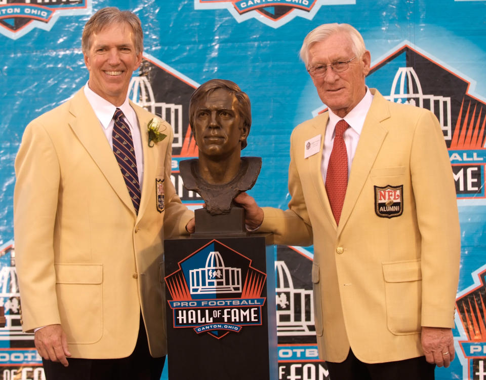 Roger Wehrli in his Hall of Fame jacket and Larry Wilson next to him in his jacket. 