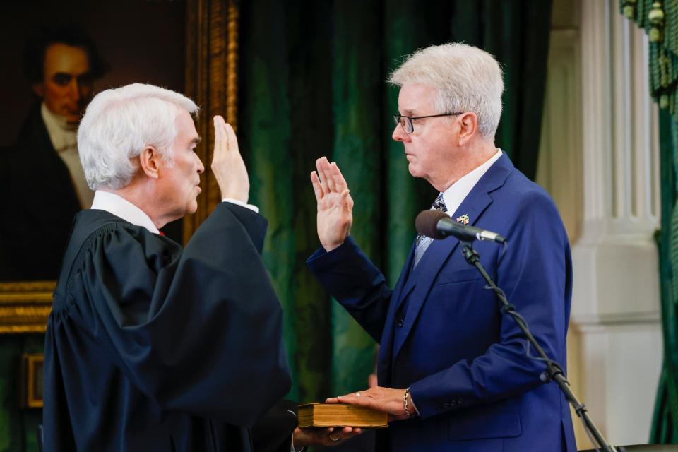 Texas Supreme Court Chief Justice Nathan Hecht swears in Lt. Gov. Dan Patrick on the first day of Attorney General Ken Paxton’s impeachment trial Tuesday. The Sam Houston Bible was used for the ceremony.