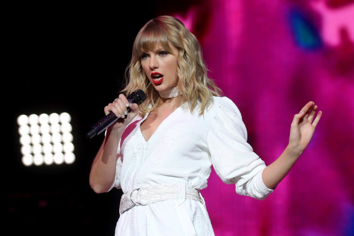 Taylor Swift fans are being warned about a surge in online scams ahead of the arrival of the Eras tour  (PA Archive)