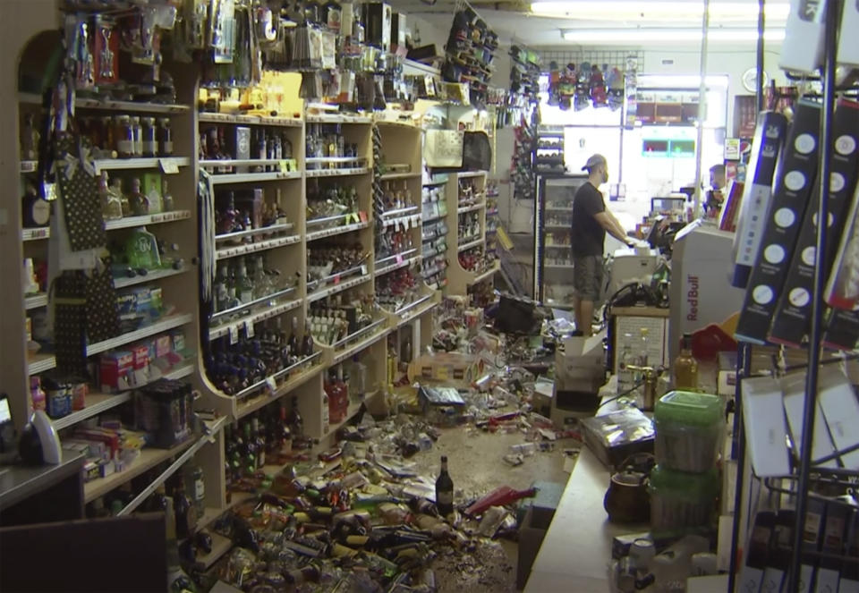 This still image taken from video shows bottles and debris on the floor of a liquor store as a result from the earthquake in Ridgecrest, Calif., on Saturday, July 6, 2019. The quake struck at 8:19 p.m. Friday and was centered 11 miles (18 kilometers) from Ridgecrest, the same area of the Mojave Desert where a 6.4-magnitude temblor hit just a day earlier. (AP Photo/APTN)