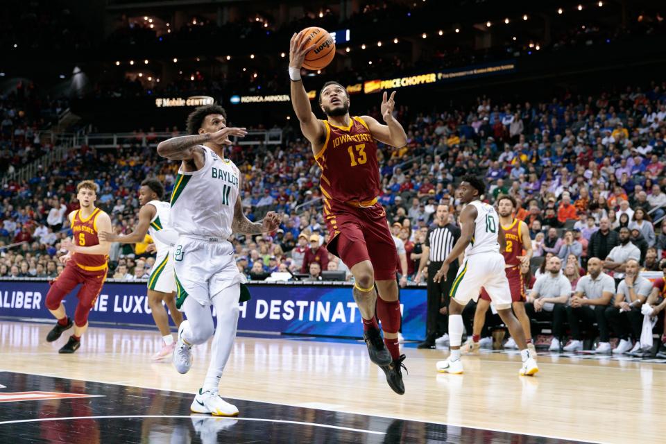 Iowa State's Jaren Holmes moves to the basket past Baylor's Jalen Bridges.