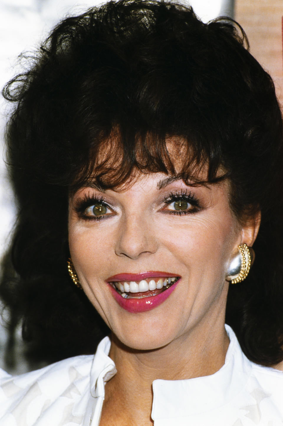 Joan Collins smiling