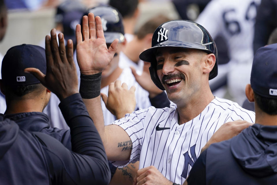 New York Yankees' Matt Carpenter celebrates after hitting a two-run home run in the sixth inning of a baseball game against the Chicago Cubs, Sunday, June 12, 2022, in New York. (AP Photo/Mary Altaffer)