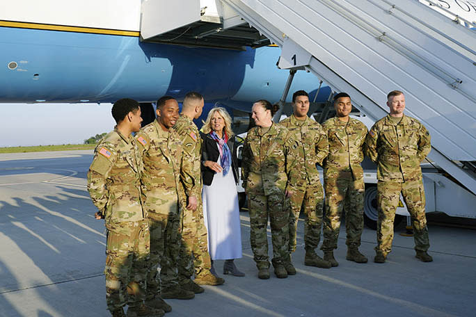 First lady Jill Biden meets on the tarmac with seven members of the Delaware Army National Guard, before departing the airport near the Mihail Kogalniceanu Air Base in Romania on May 6, 2022. - Credit: AP