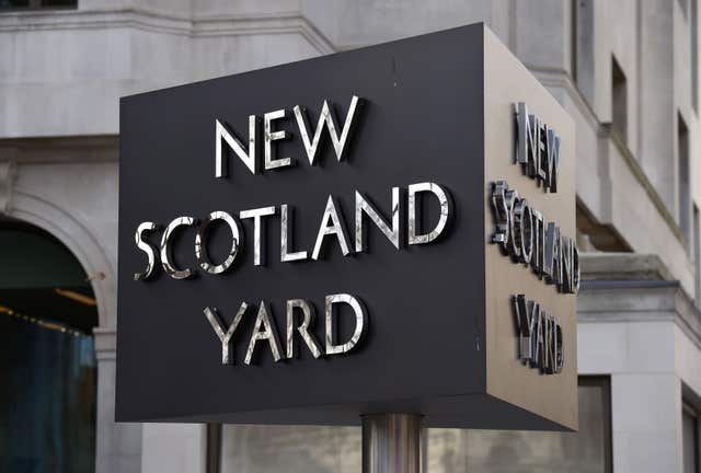 The New Scotland Yard sign outside the Metropolitan Police headquarters