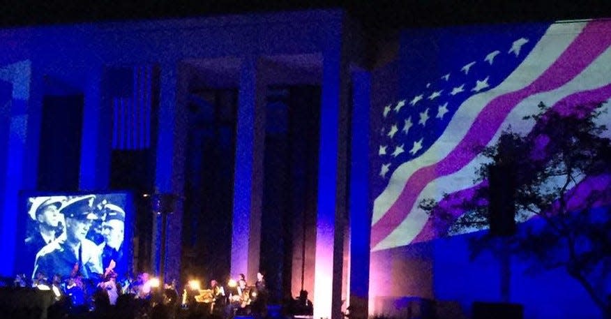 The Salina Symphony performs in front of a patriotic backdrop during a previous edition of the "Symphony at Sunset" concert at the Eisenhower Presidential Library. The concert this year will take place on June 1.