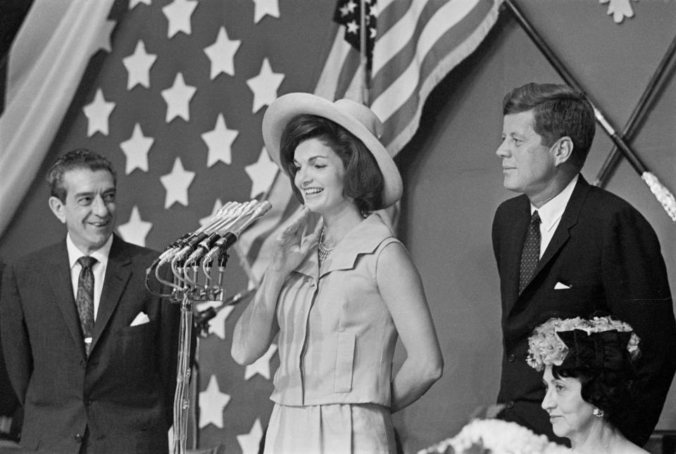 Kennedy takes center stage in Mexico City alongside her husband and President Adolfo Mateos.