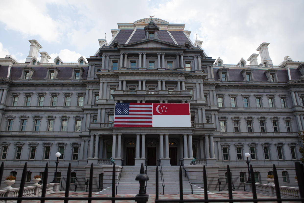 Washington, D.C.  On Tuesday, August 2, United States and Singapore flags hang on the front of the Eisenhower Executive Office Building, in honor of a State visit to the White House by Prime Minister Lee Hsien Loong. (Photo by Cheriss May/NurPhoto via Getty Images)