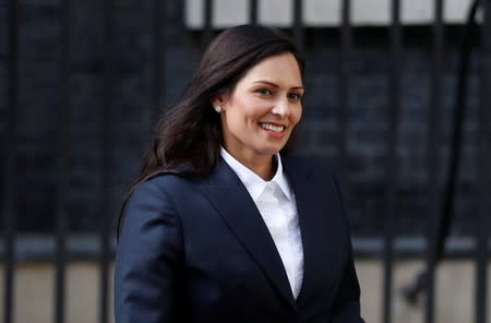 Newly appointed Britain's Home Secretary Priti Patel leaves Downing Street, in London