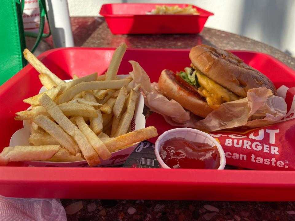 In-N-Out Burger food, red tray with burger and fries