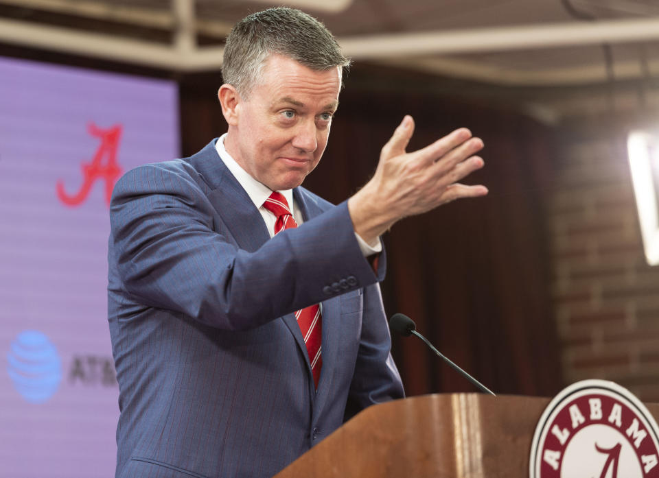 Alabama athletic director Greg Byrne gestures as he introduces Nate Oats as the new basketball coach for the University of Alabama, Thursday, March 28, 2019, in Tuscaloosa, Ala. (AP Photo/Vasha Hunt)