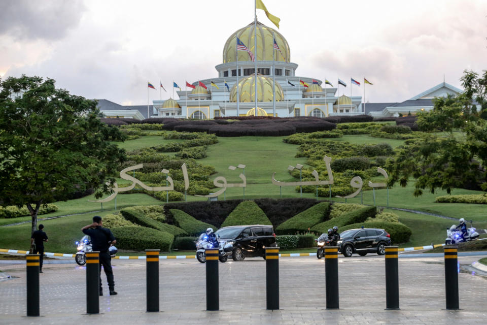 Luxury vehicles believed to be carrying senior political leaders leave Istana Negara February 23, 2020. — Picture by Firdaus Latif