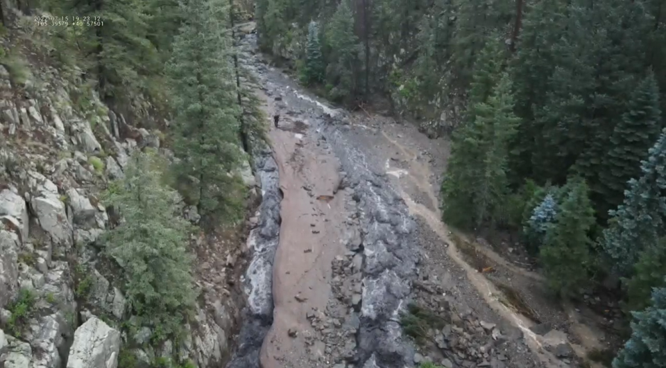 This photo shows Larimer County Road 44H (Buckhorn Road) taken by a drone after a flash flood Friday just 20 miles west of Fort Collins, Colo. The road was heavily damaged by the flood.