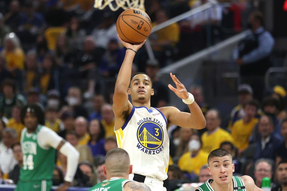 Golden State Warriors guard Jordan Poole shoots against the Boston Celtics during the first half of Game 1 of the NBA Finals in San Francisco.