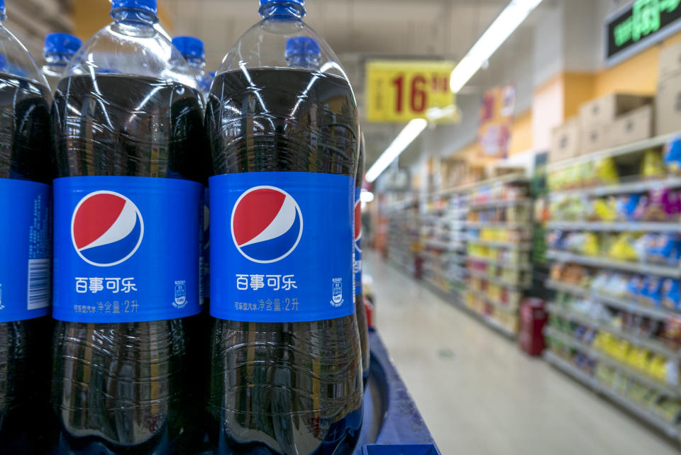 BEIJING, CHINA - 2015/08/11: Pepsi products in a Chinese supermarket.  Coke companies are suffering large decline in consumption of sugary sodas as consumers worry about obesity.  Pepsi declares to replace the sweetener aspartame from the drink, while Coca-Cola is trying to spread the message that sugary sodas have no deleterious effect on health. (Photo by Zhang Peng/LightRocket via Getty Images)