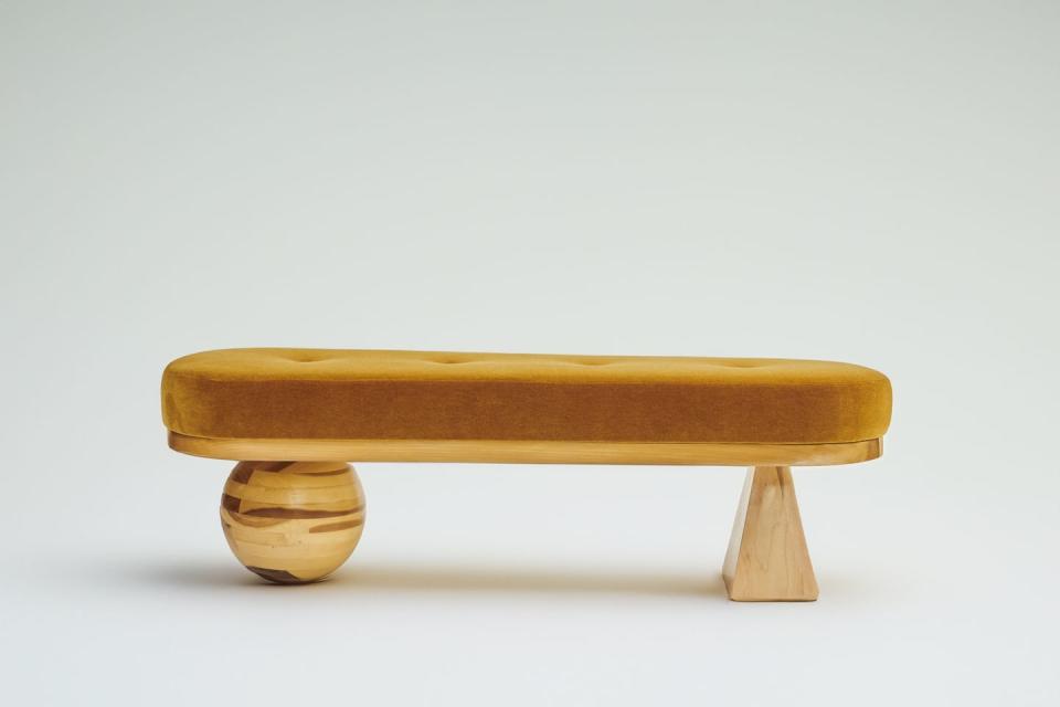 a wooden bowl with a wooden base