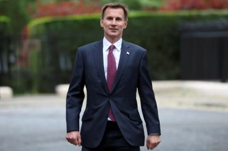 Britain's Foreign Secretary Jeremy Hunt arrives at his home in London