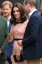 <p>Middleton wears a baby pink floral dress by Orla Kiely during a <a href="https://www.harpersbazaar.com/celebrity/latest/a13026509/kate-middleton-baby-bump-paddington-appearance/" rel="nofollow noopener" target="_blank" data-ylk="slk:charity event;elm:context_link;itc:0;sec:content-canvas" class="link ">charity event</a> at Paddington Station.</p>