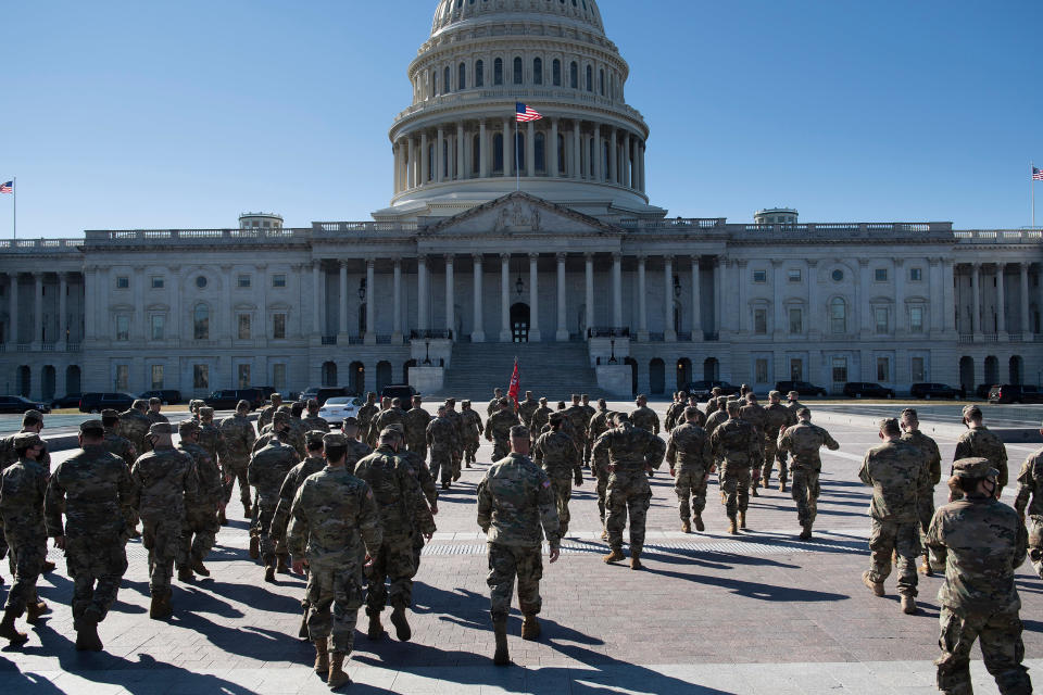 Members of the National Guard are seen on the East Front of the U.S. Capitol Building on March 2, 2021, in Washington, DC. / Credit: BRENDAN SMIALOWSKI/AFP via Getty Images