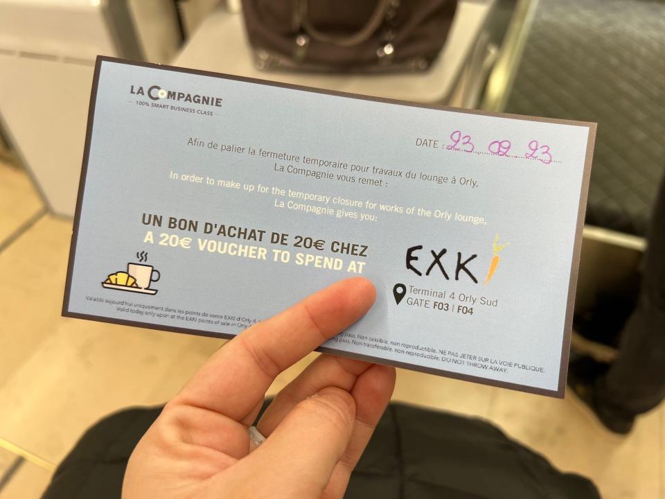 Flying on La Compagnie all-business class airline from Paris to New York — my restaurant voucher.