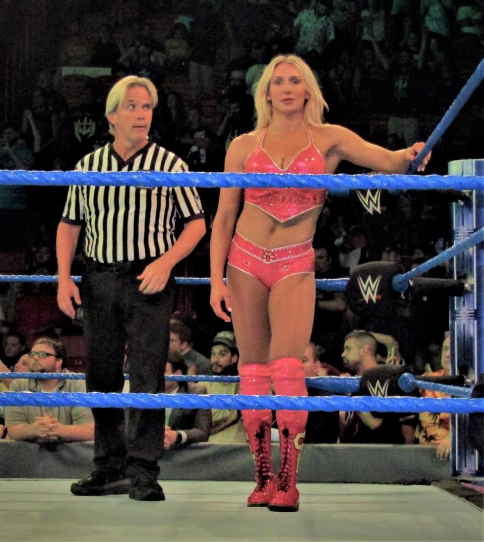 WWE Superstar The Queen Charlotte Flair with WWE Referee Charles Robinson at the American Airlines Arena in Miami in July 2019.