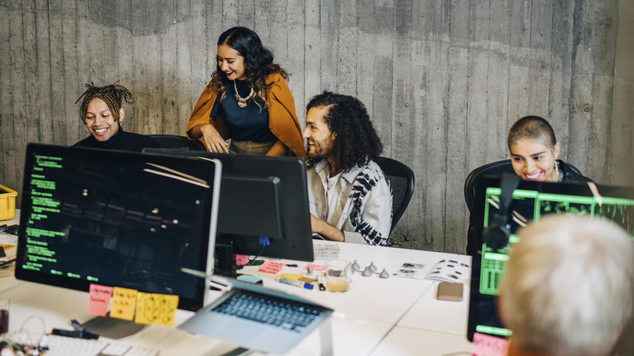  People learning coding & programming at a coding bootcamp. 