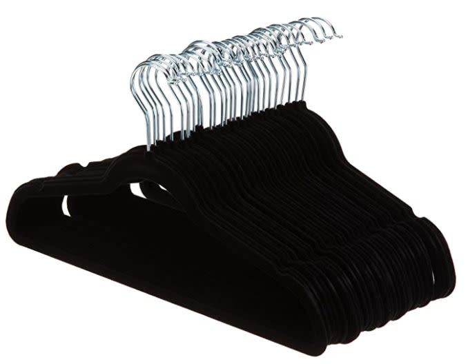 Get this set of <a href="https://amzn.to/2H9LapK" target="_blank" rel="noopener noreferrer">AmazonBasics slim velvet non-slip clothes hangers on sale for $10</a> (normally $19) on Amazon.