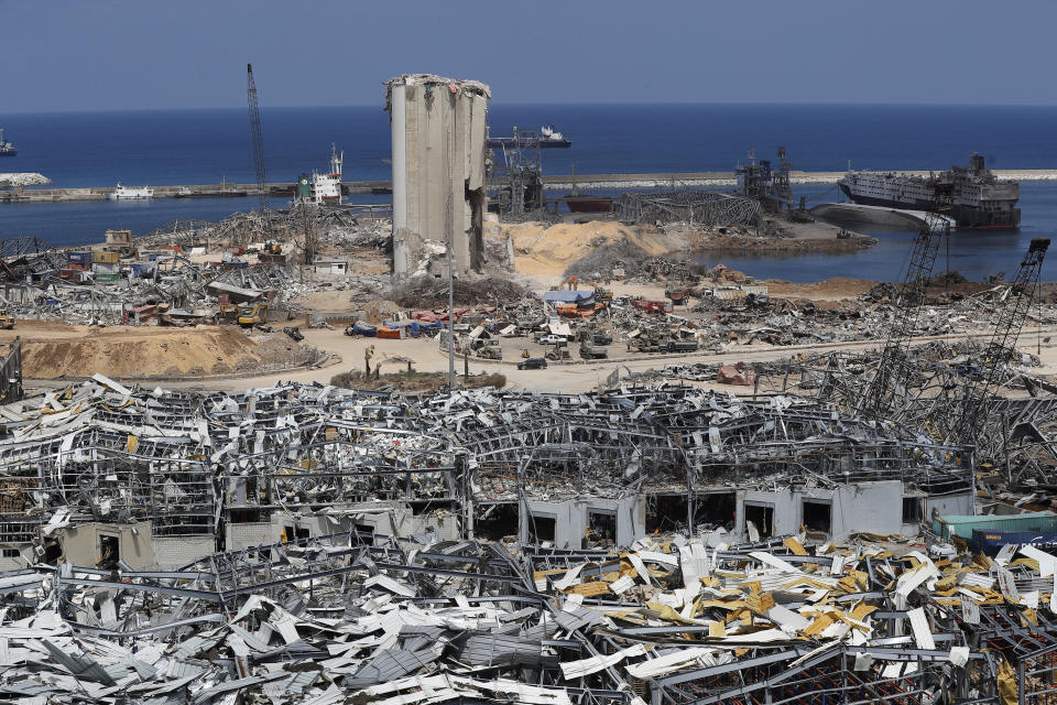 This Wednesday, Aug. 19, 2020 photo shows the the scene of the Aug. 4 explosion that hit the seaport of Beirut, Lebanon. For many, the Iran-backed Hezbollah now stands at the top of Lebanon’s sectarian-based system of power — and so is complicit in the corruption many blame for the port disaster and for driving the country into near bankruptcy. (AP Photo/Hussein Malla)