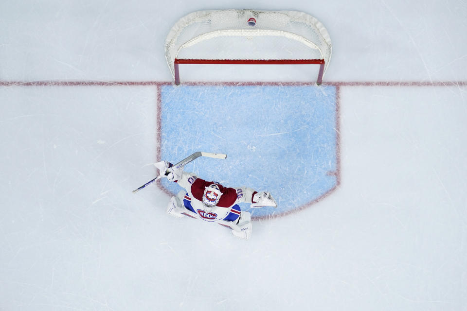 Montreal Canadiens' Cayden Primeau stretches during the second period of an NHL hockey game against the Philadelphia Flyers, Tuesday, March 28, 2023, in Philadelphia. (AP Photo/Matt Slocum)