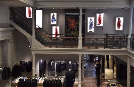 The main showroom is seen at Gieves and Hawkes Savile Row headquarters in central London, Britain, August 19, 2015. Gieves and Hawkes has contracts with British military forces and has a royal warrant to supply military uniforms and livery for Queen Elizabeth. REUTERS/Toby Melville