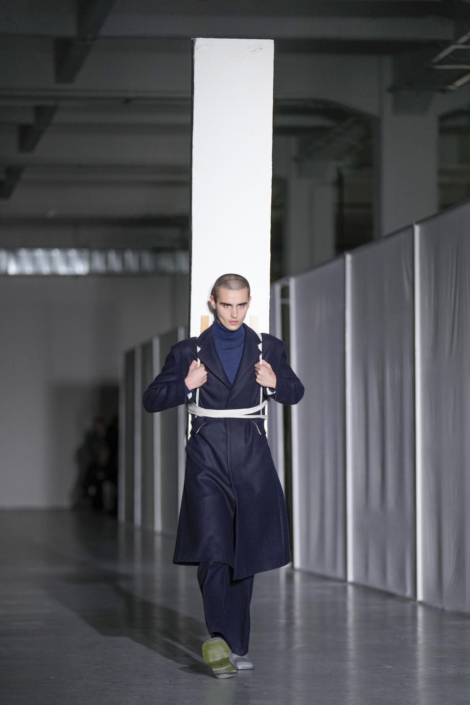 A model wears a creation as part of the men's Federico Cina Fall-Winter 2024-2025 collection, that was presented in Milan, Italy, Saturday, Jan. 13, 2024. (AP Photo/Antonio Calanni).