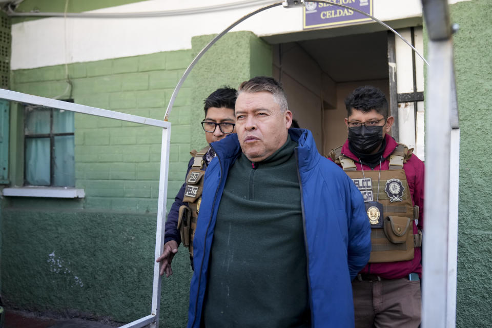 Juan Jose Zuniga, former commanding general of the Army, is escorted from a jail to be taken to Chonchocoro maximum security prison, in La Paz, Bolivia, Saturday, June 29, 2024. Zuniga was detained for his involvement in what President Luis Arce called a coup attempt. (AP Photo/Juan Karita)