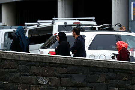 People walk outside a hospital in Christchurch, New Zealand March 18, 2019. REUTERS/Jorge Silva