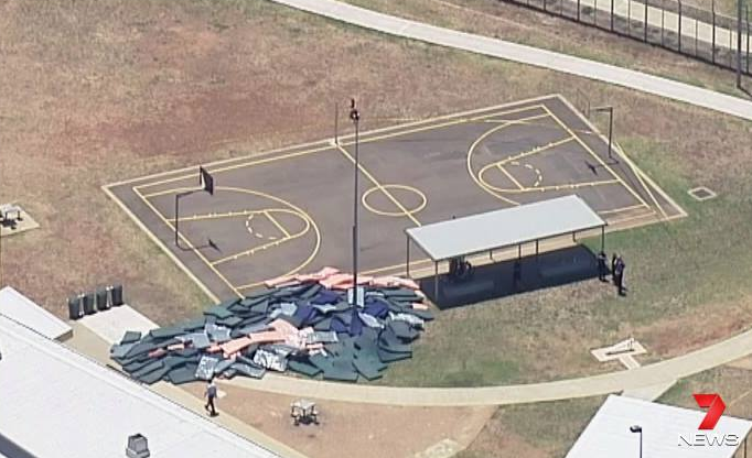 The centre went into lockdown after a prisoner climbed a pole. Photo: 7 News